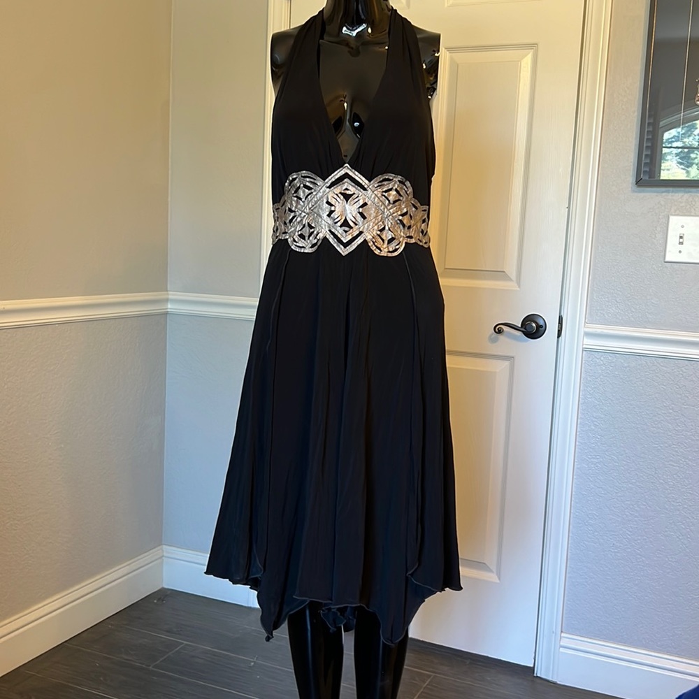 Bebe black halter dress, fully lined, stretchy, leather design on front